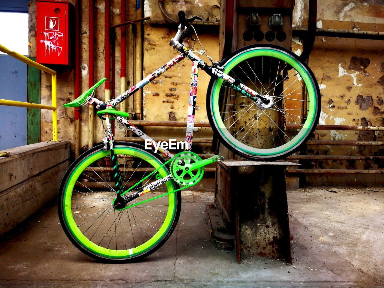 BICYCLE PARKED ON WALL