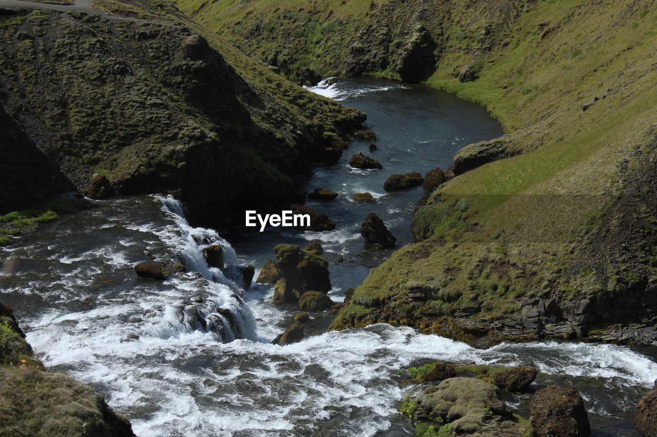 SCENIC VIEW OF STREAM FLOWING IN WATER