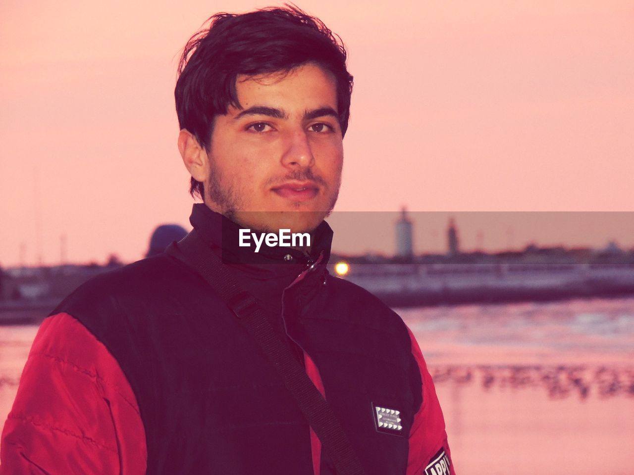 Portrait of man against sky during sunset