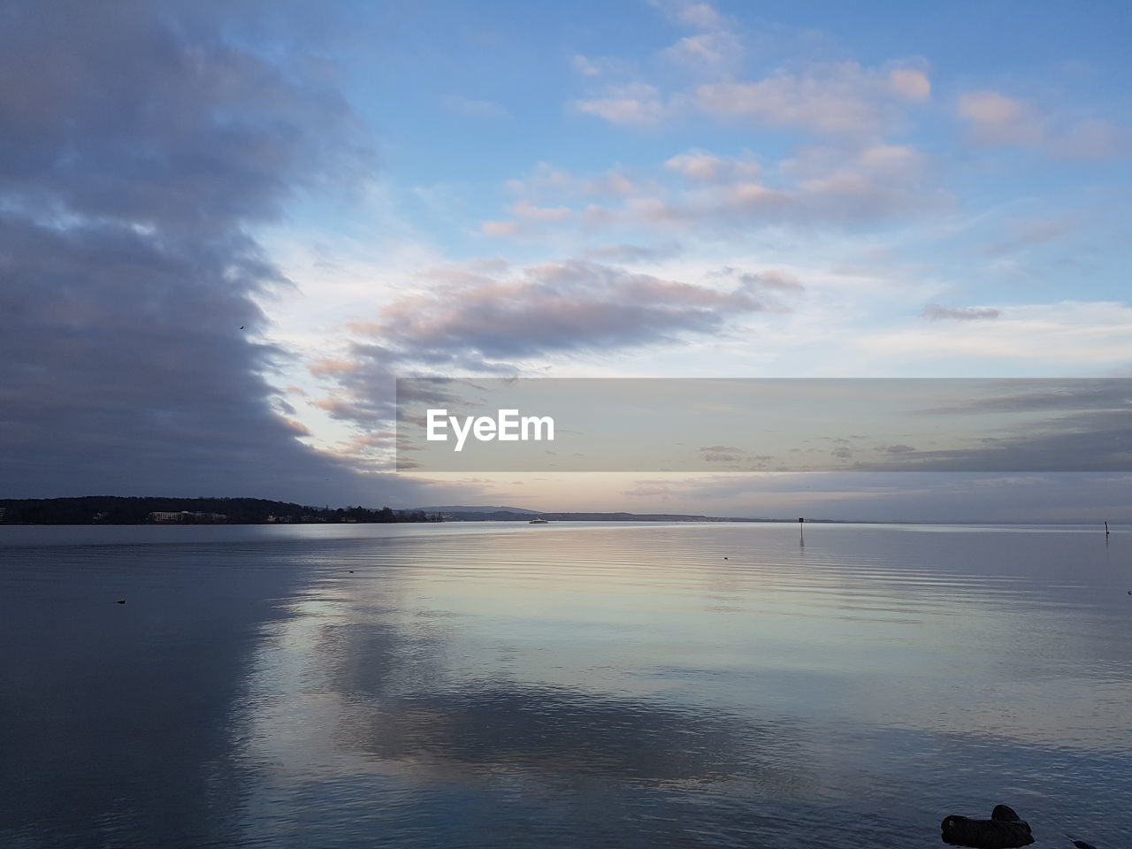 SEA AGAINST SKY DURING SUNSET