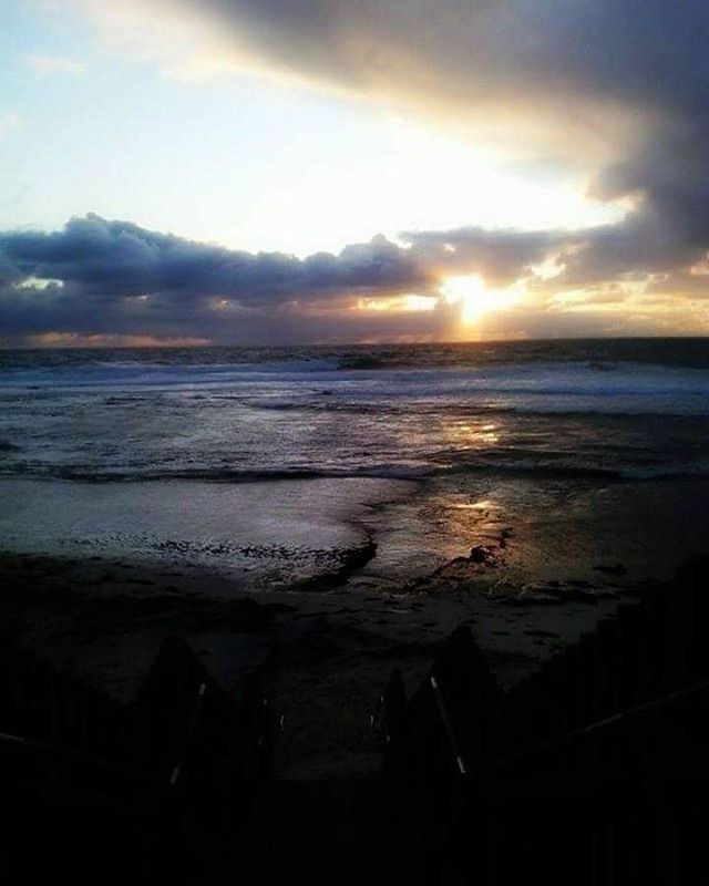 SCENIC VIEW OF SEA DURING SUNSET