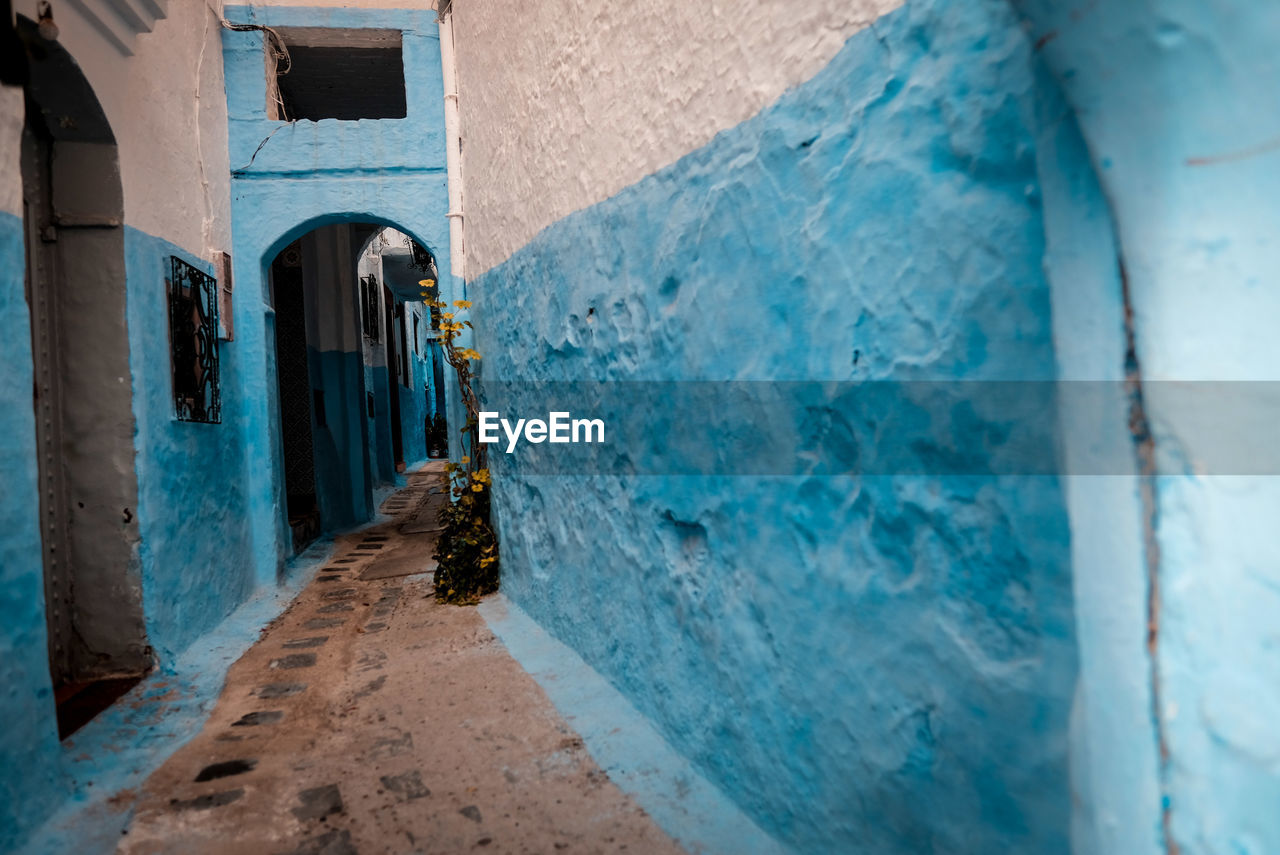 Narrow alley amidst buildings