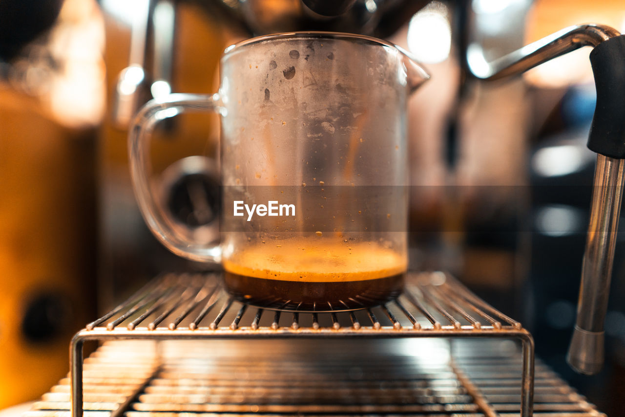 close-up of coffee in glass