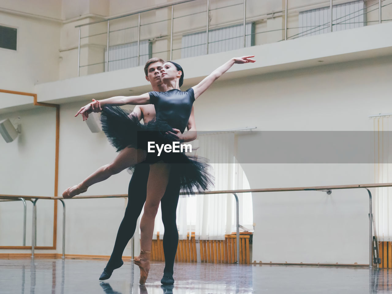 Full length of ballet dancers dancing