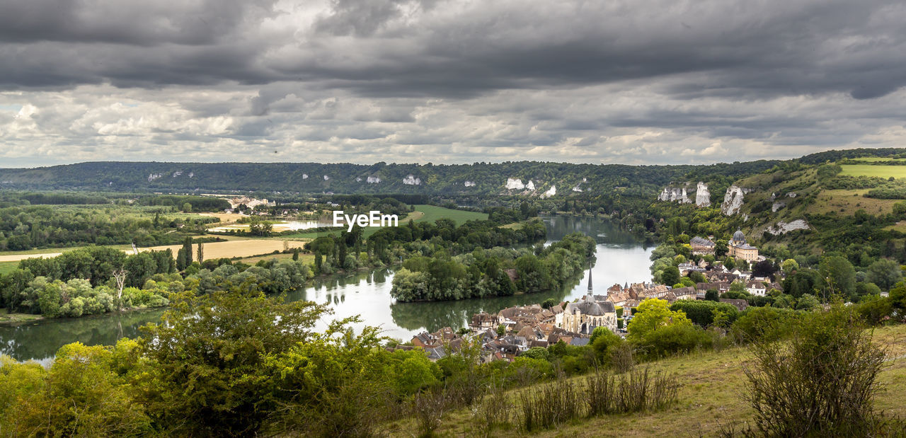 Scenic view of landscape against sky, river with small  island in france