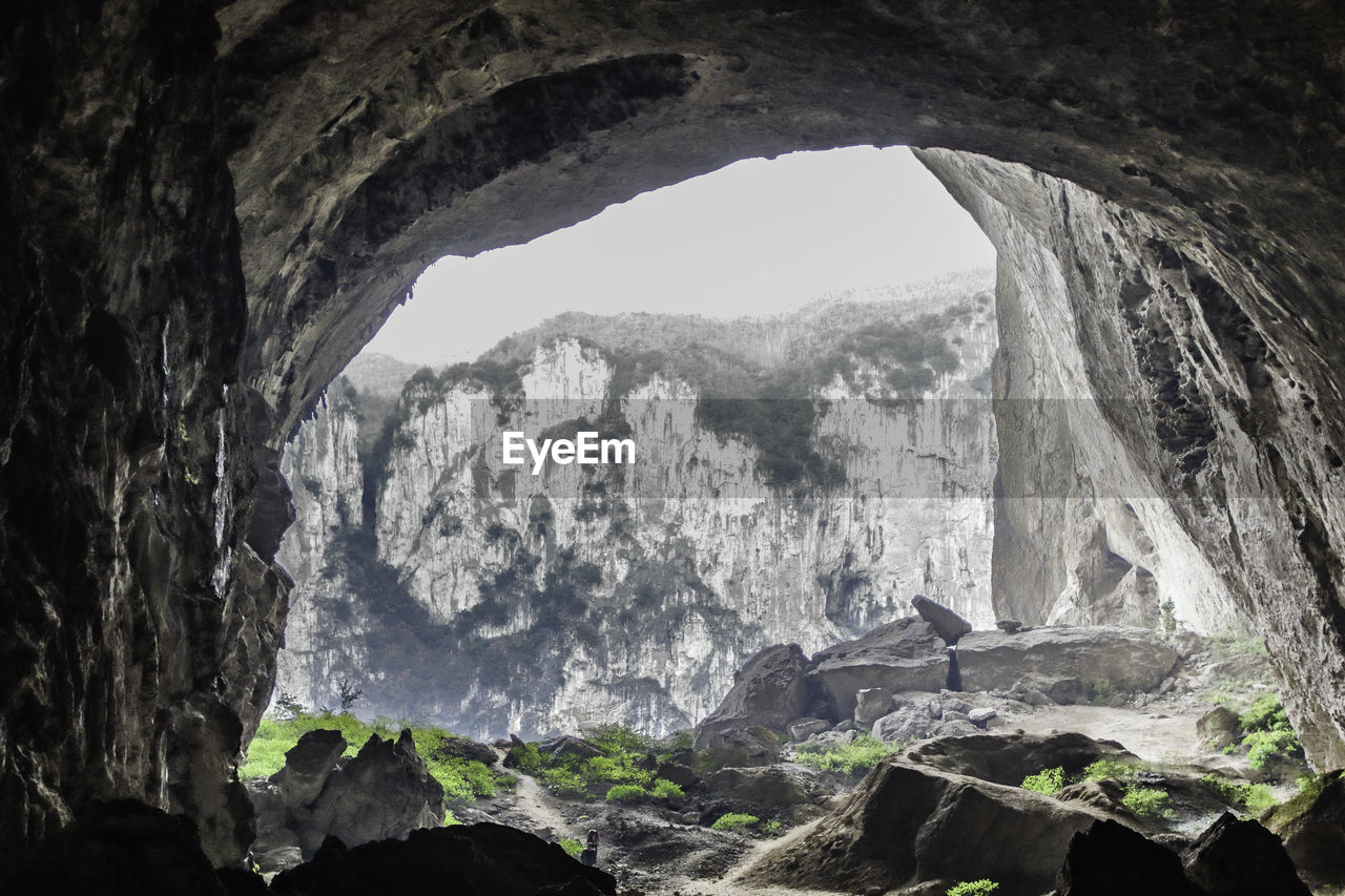 LOW ANGLE VIEW OF ROCK FORMATIONS