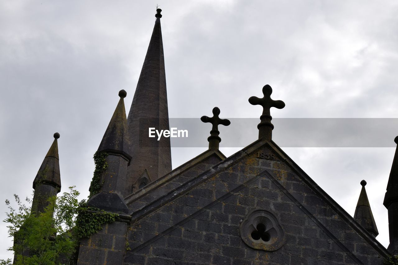 LOW ANGLE VIEW OF BELL TOWER AGAINST THE SKY