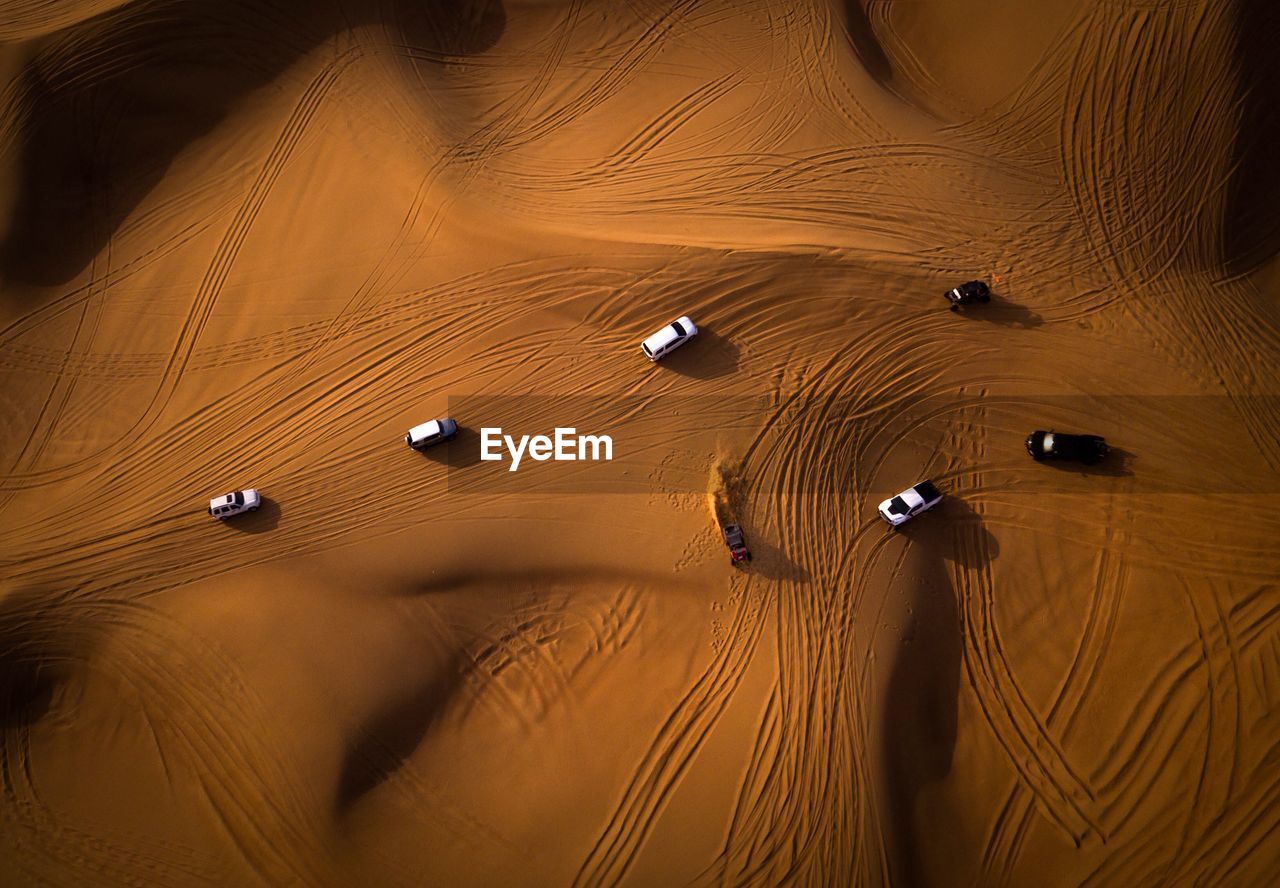 High angle view of vehicles on desert