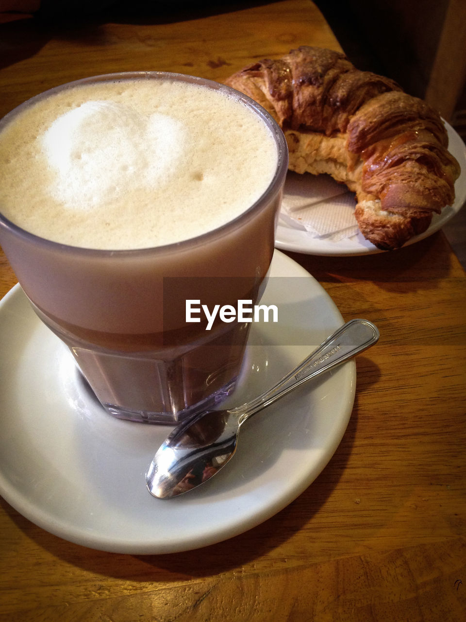 food and drink, drink, table, refreshment, coffee - drink, frothy drink, coffee cup, indoors, freshness, saucer, food, close-up, croissant, plate, cappuccino, no people, froth art, day