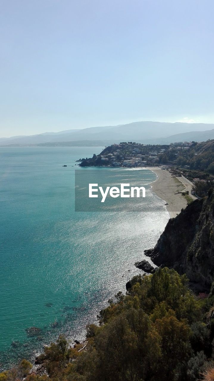 VIEW OF BEACH AGAINST CLEAR SKY