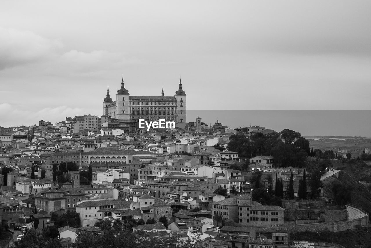 Scenic view of residential district against sky