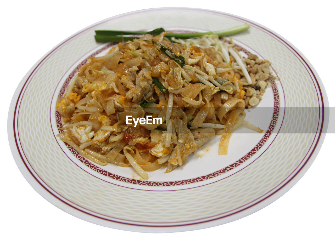 Thailand fried noodles, as pad thai with the bean sprout, egg and green onion