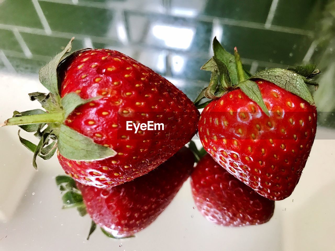 CLOSE-UP OF STRAWBERRIES WITH STRAWBERRY