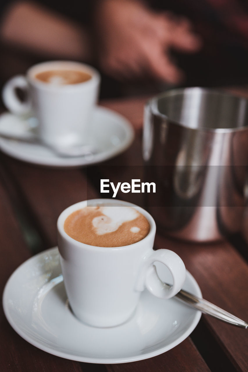 Coffee cup on table