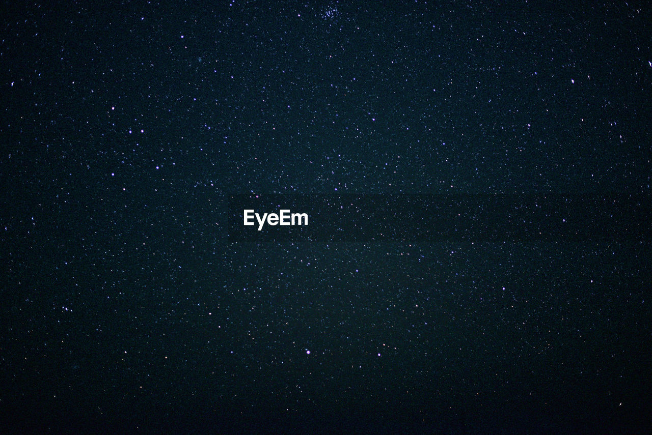 LOW ANGLE VIEW OF STARS AGAINST SKY