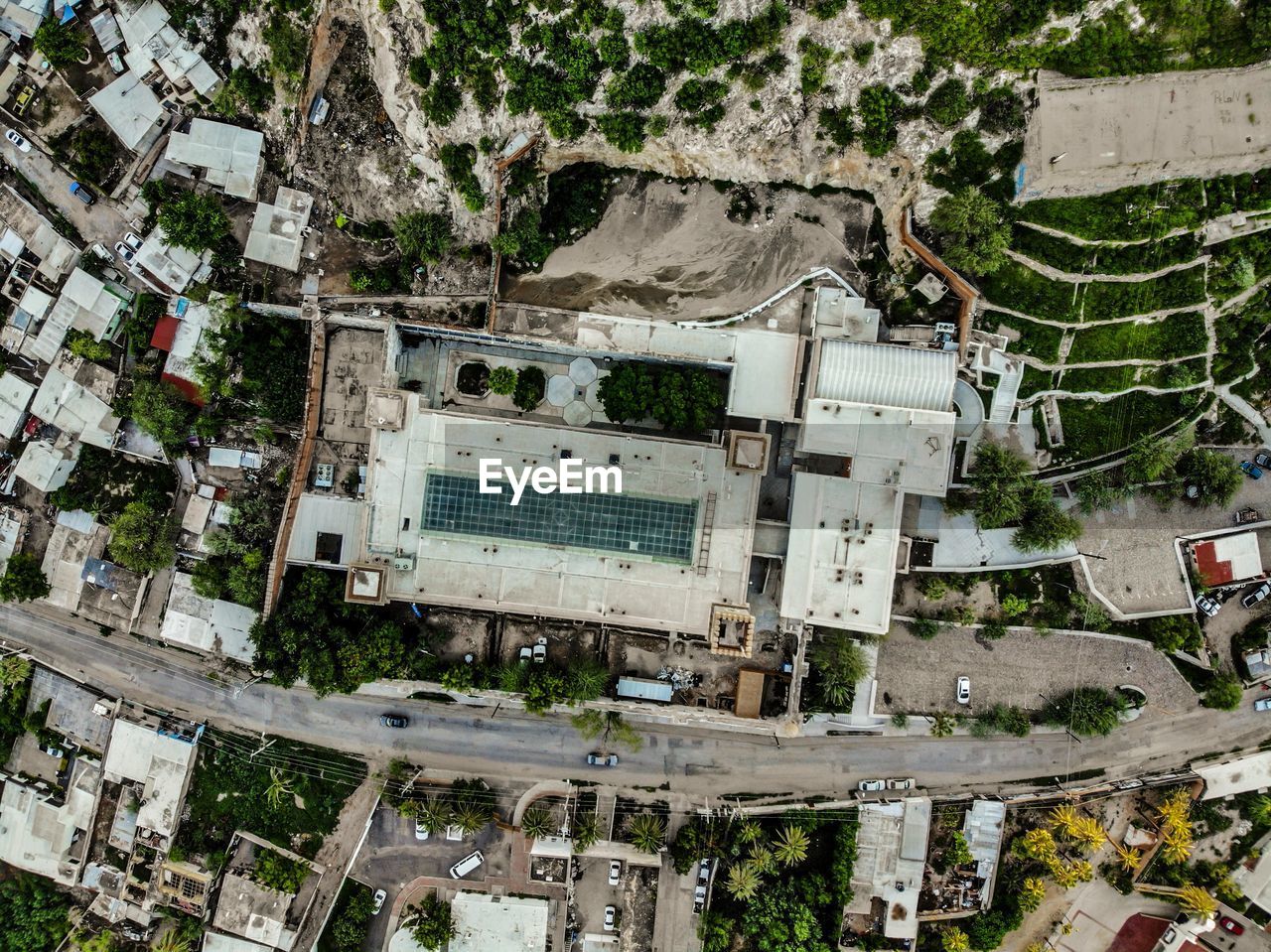 HIGH ANGLE VIEW OF BUILDINGS AND ROAD