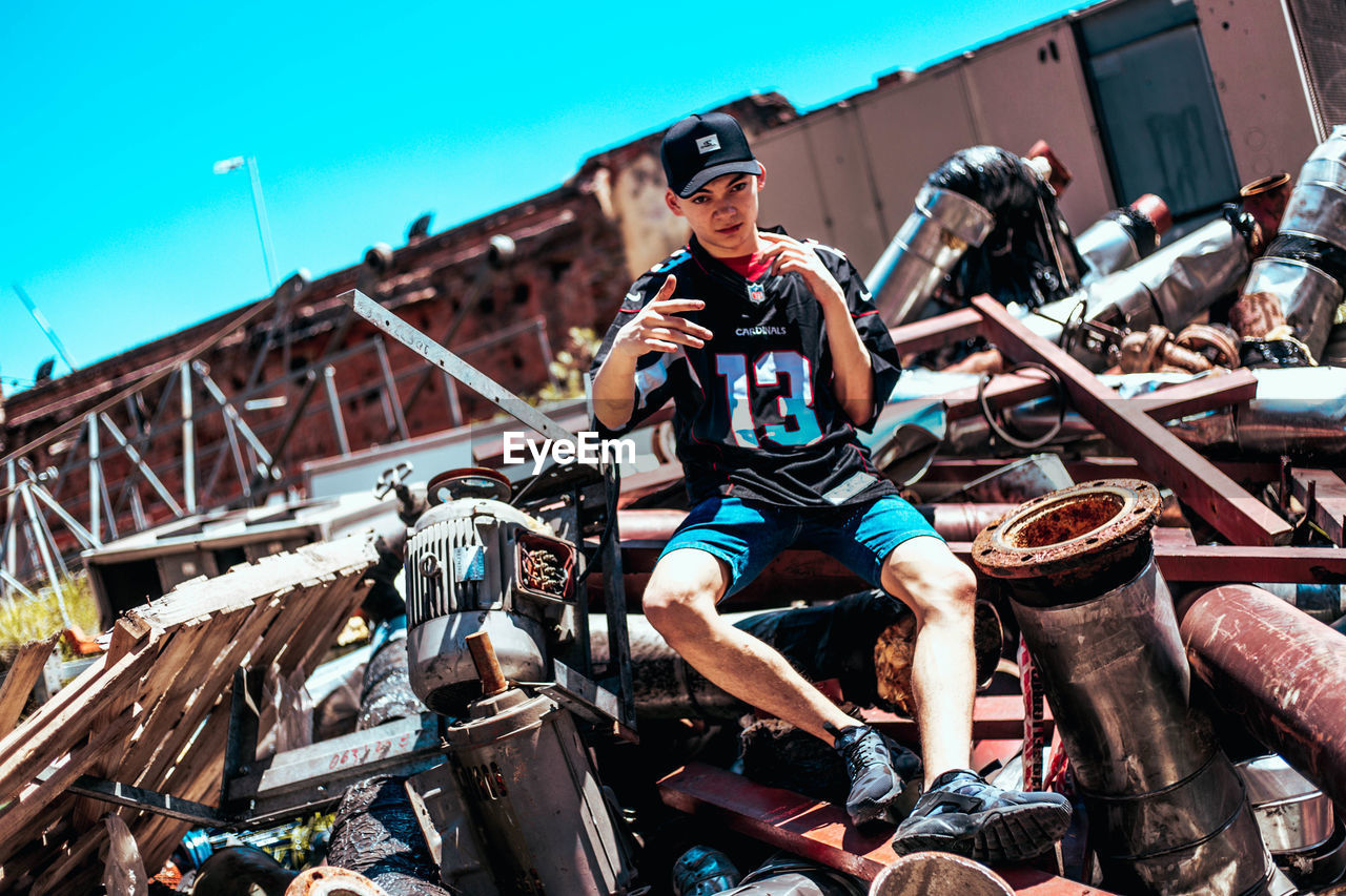 YOUNG MAN RIDING BICYCLES