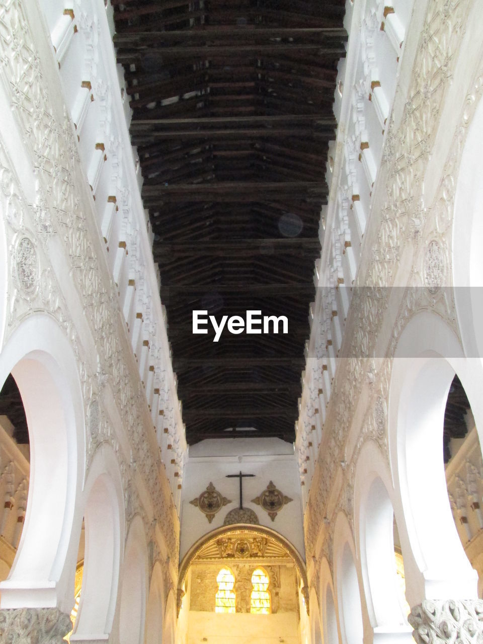 LOW ANGLE VIEW OF INTERIOR OF HISTORIC BUILDING