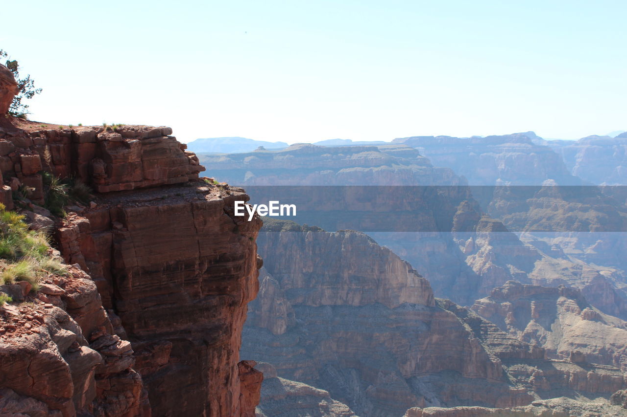 SCENIC VIEW OF CLIFF AGAINST SKY