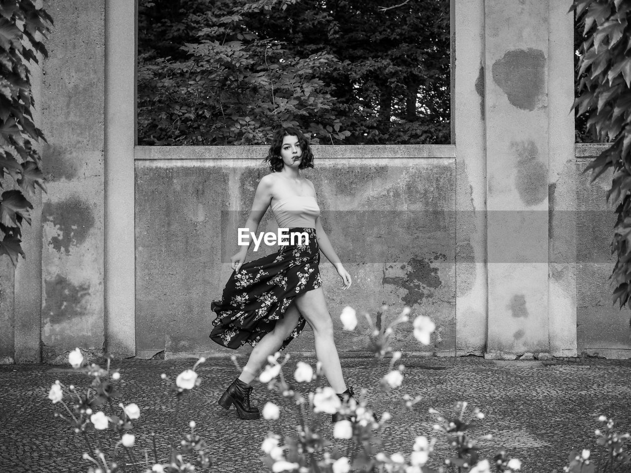 FULL LENGTH PORTRAIT OF YOUNG WOMAN WITH UMBRELLA