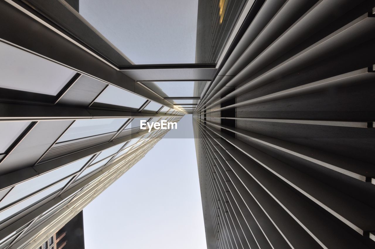 LOW ANGLE VIEW OF BUILDINGS AGAINST SKY