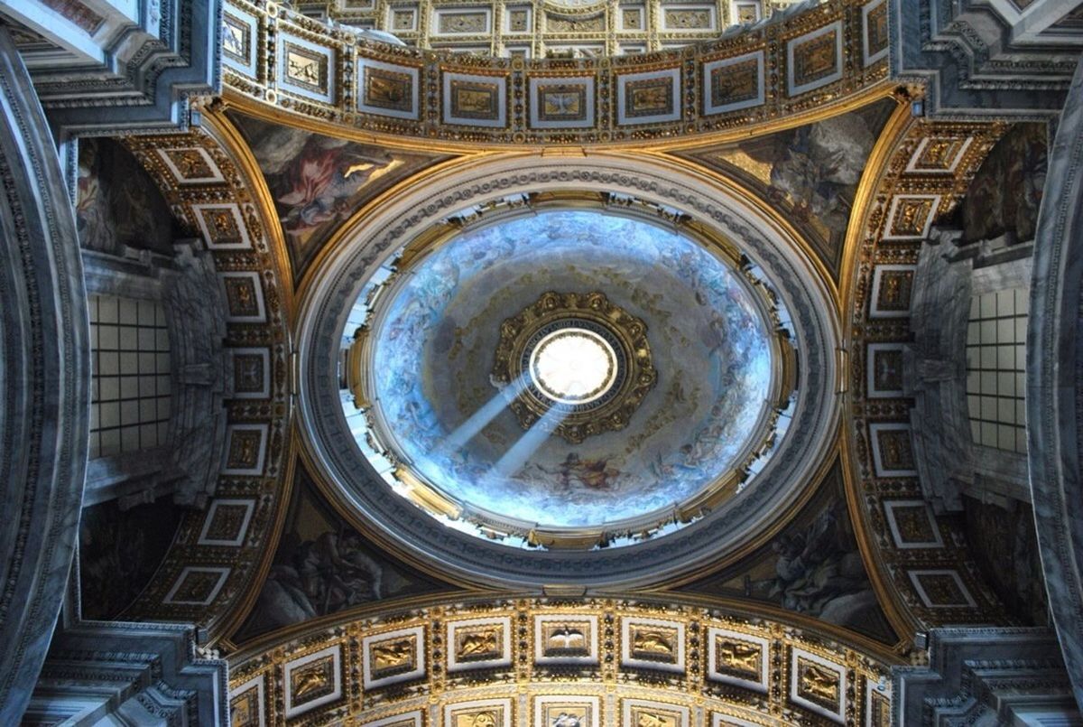 Directly below shot of st peter basilica ceiling