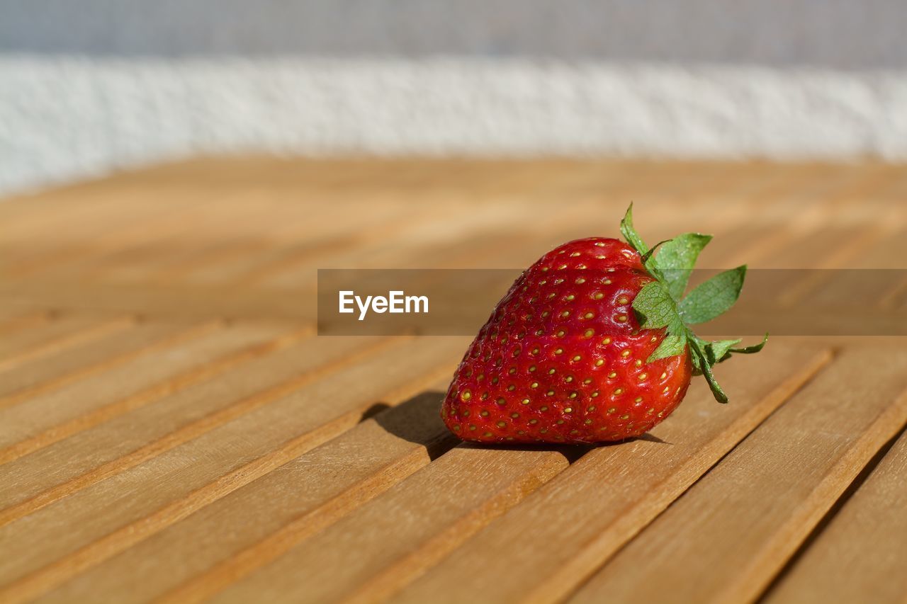 Close-up of strawberry on table