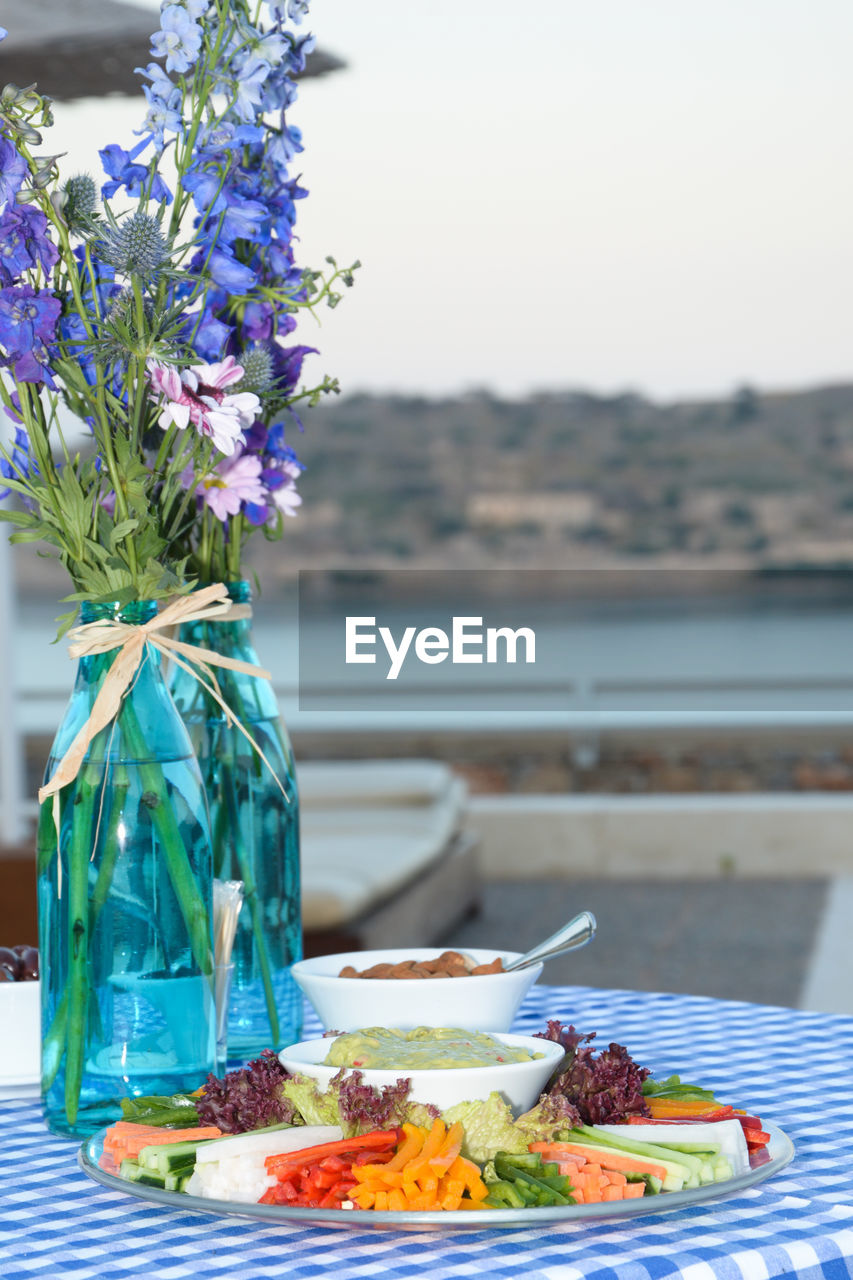 Close-up of flowers in plate on table