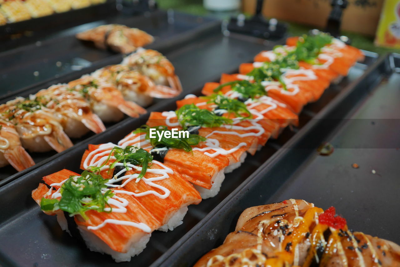 Close-up of sushi on tray