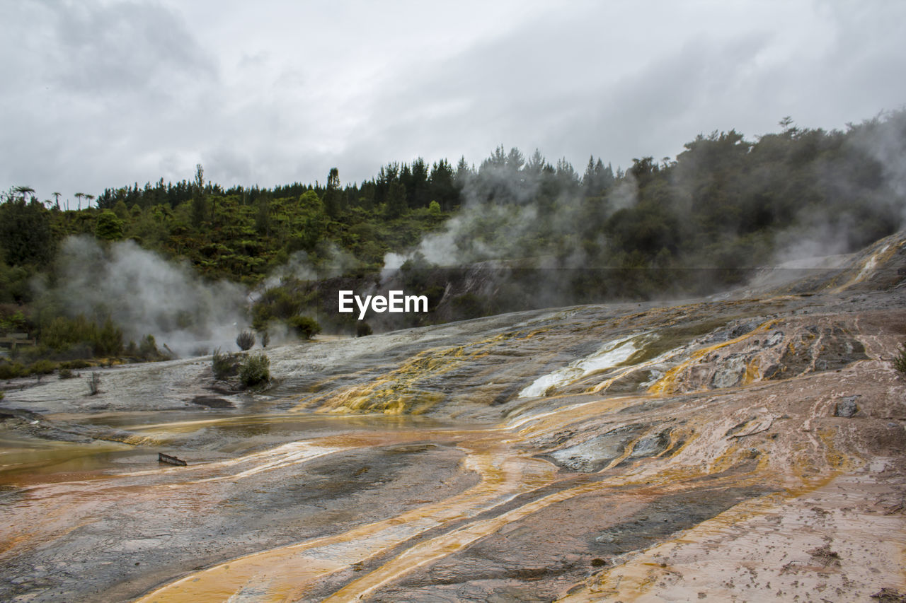 Rainbow and cascade silica terrace, geothermal park in new zealand