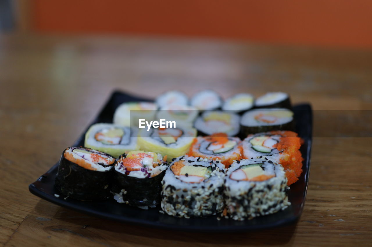 Close-up of sushi served on table