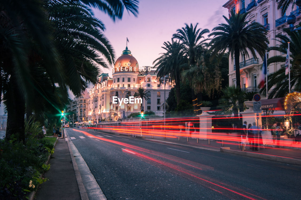 VIEW OF LIGHT TRAILS ON ROAD