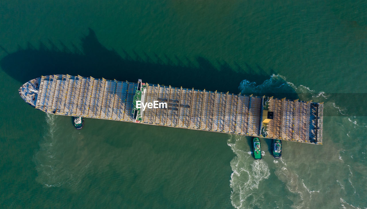 Aerial view of commercial dock in sea