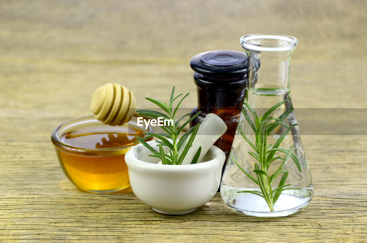 Honey, rosemary and essential oil for homeopathy remedy.
