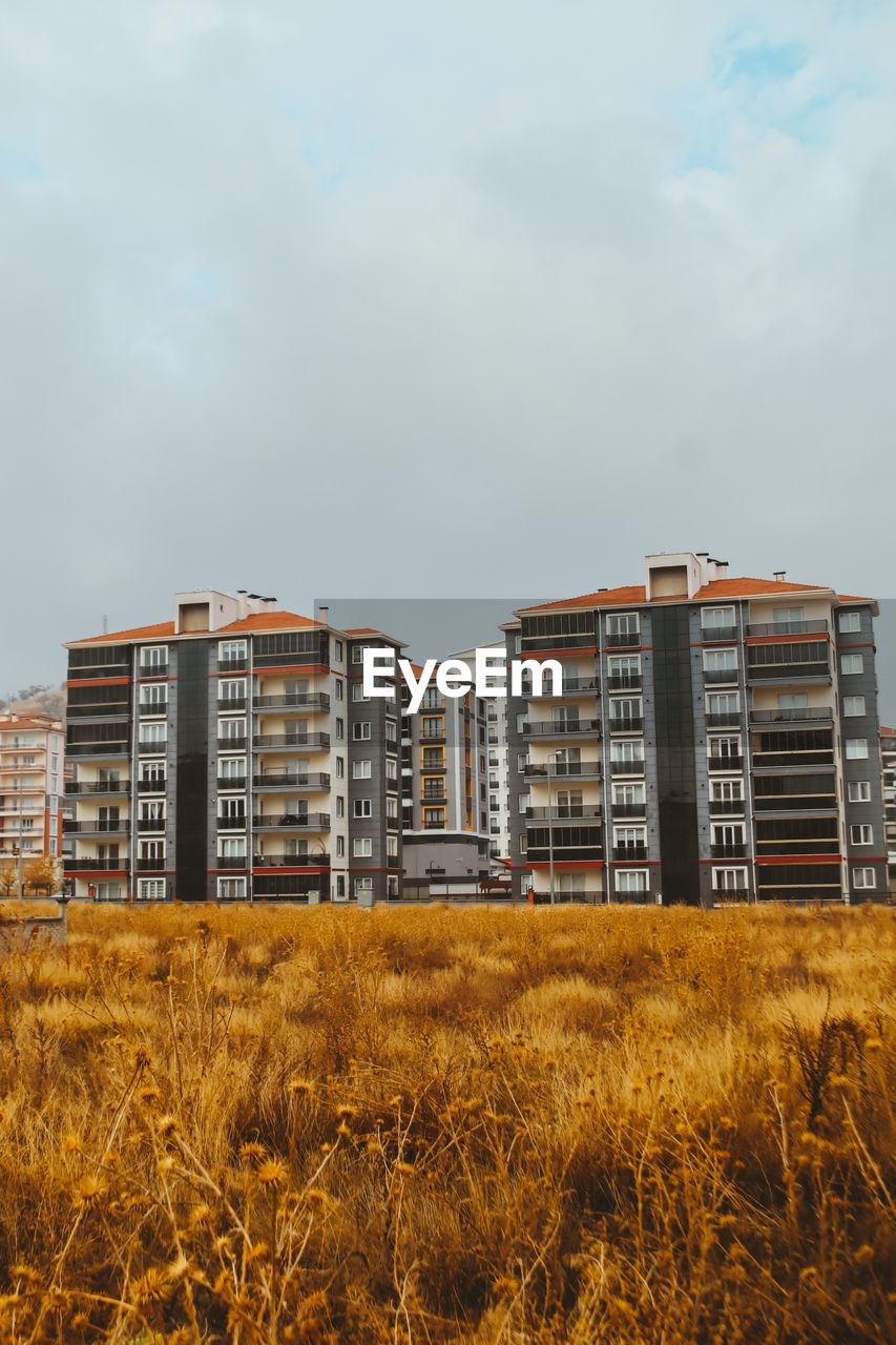 buildings in city against sky