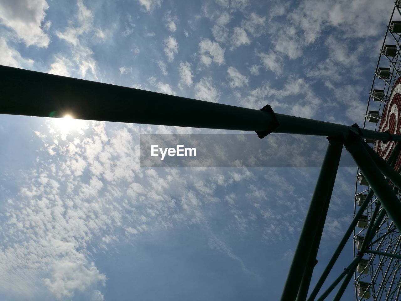 LOW ANGLE VIEW OF BASKETBALL AGAINST SKY