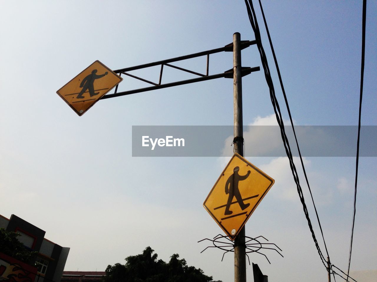 LOW ANGLE VIEW OF ROAD SIGNS