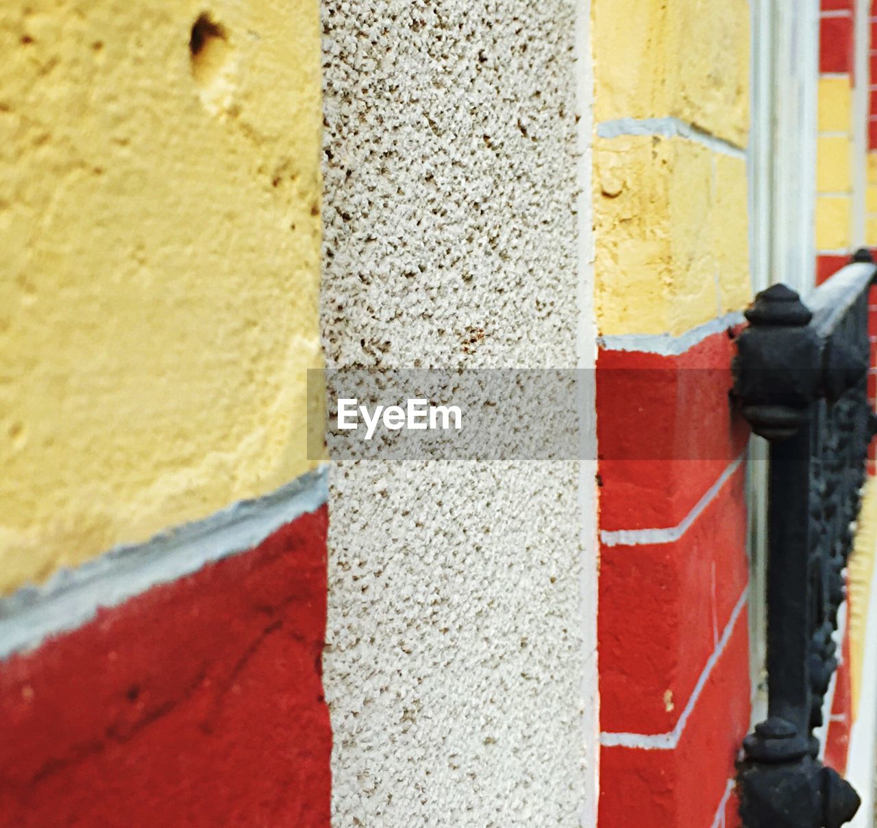 CLOSE-UP OF WALL WITH RED WALL