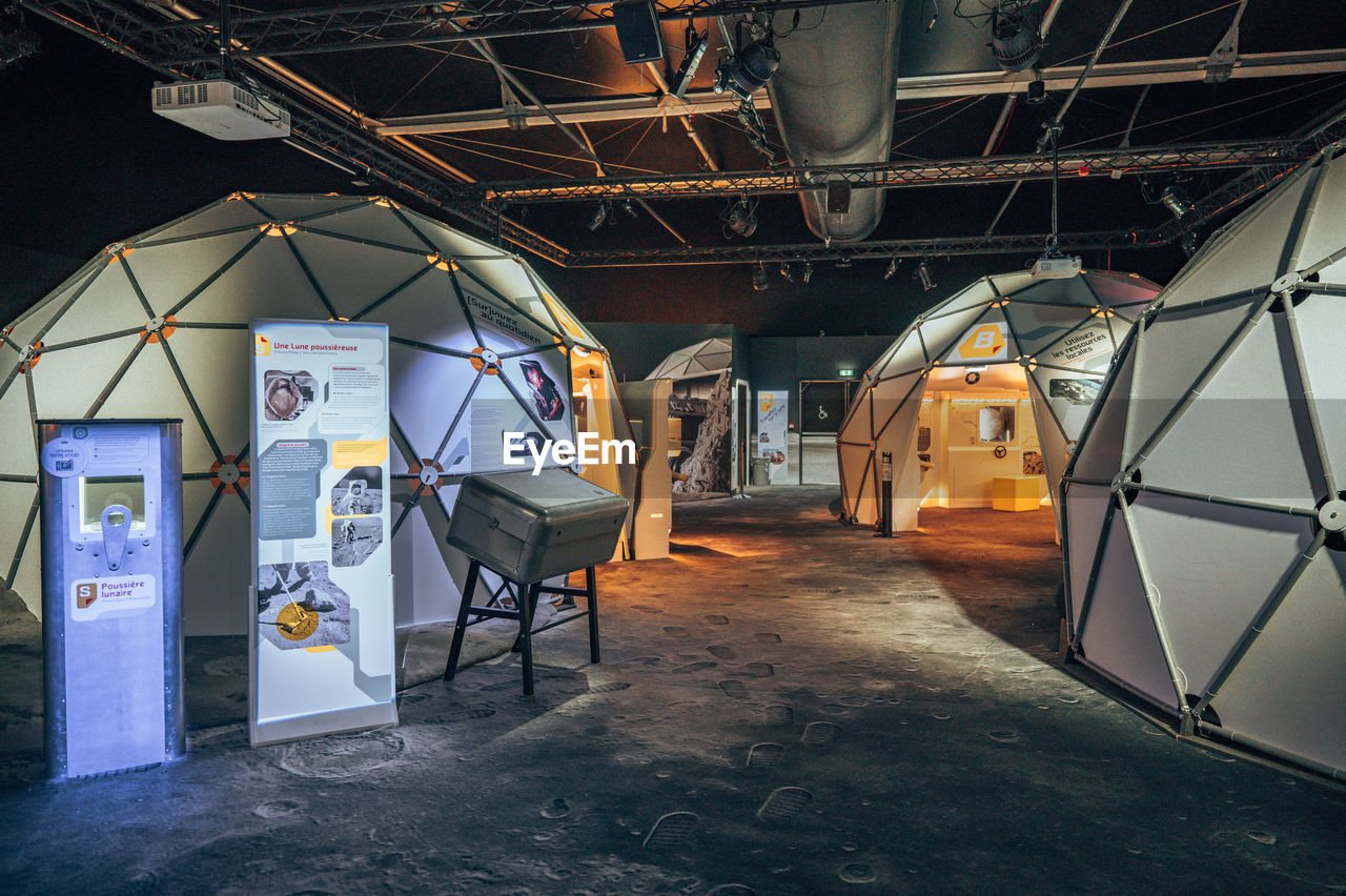 INTERIOR OF ILLUMINATED EMPTY BUILDING