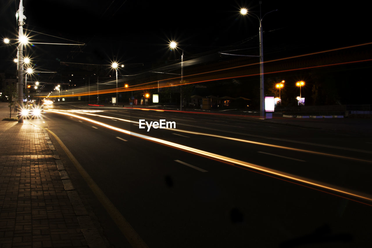 Light trails on city street at night