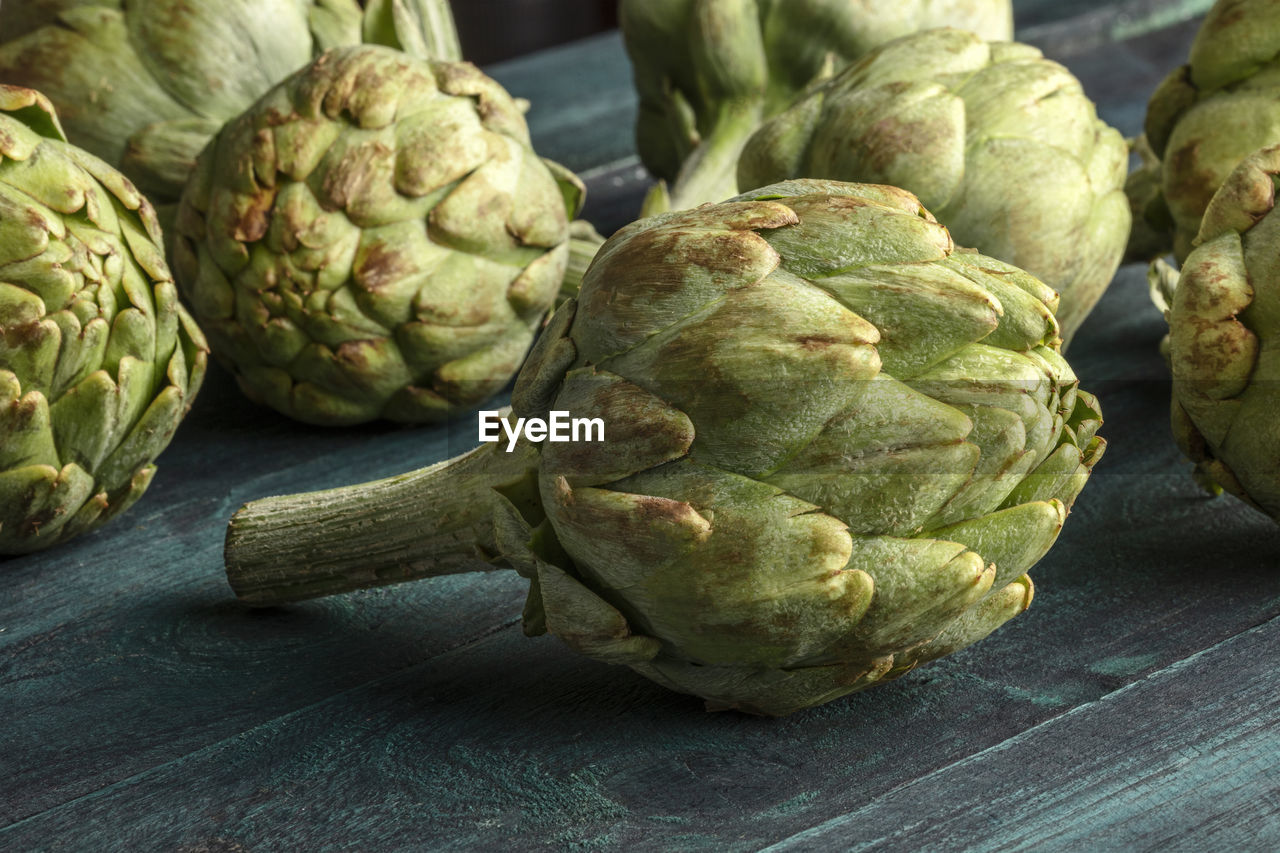 Close-up of artichoke on table