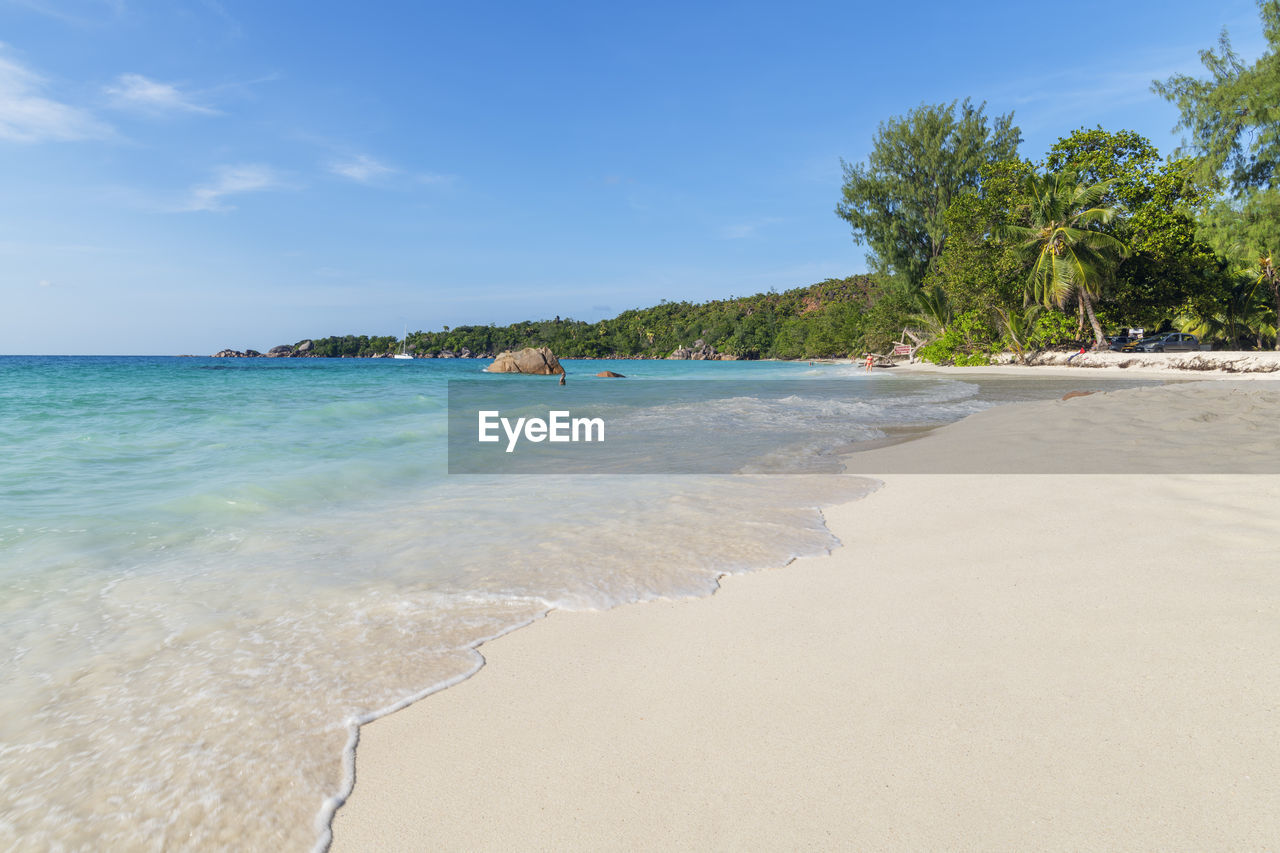 Seychelles, praslin island, anse lazio sandy beach with crystal clear turquoise ocean