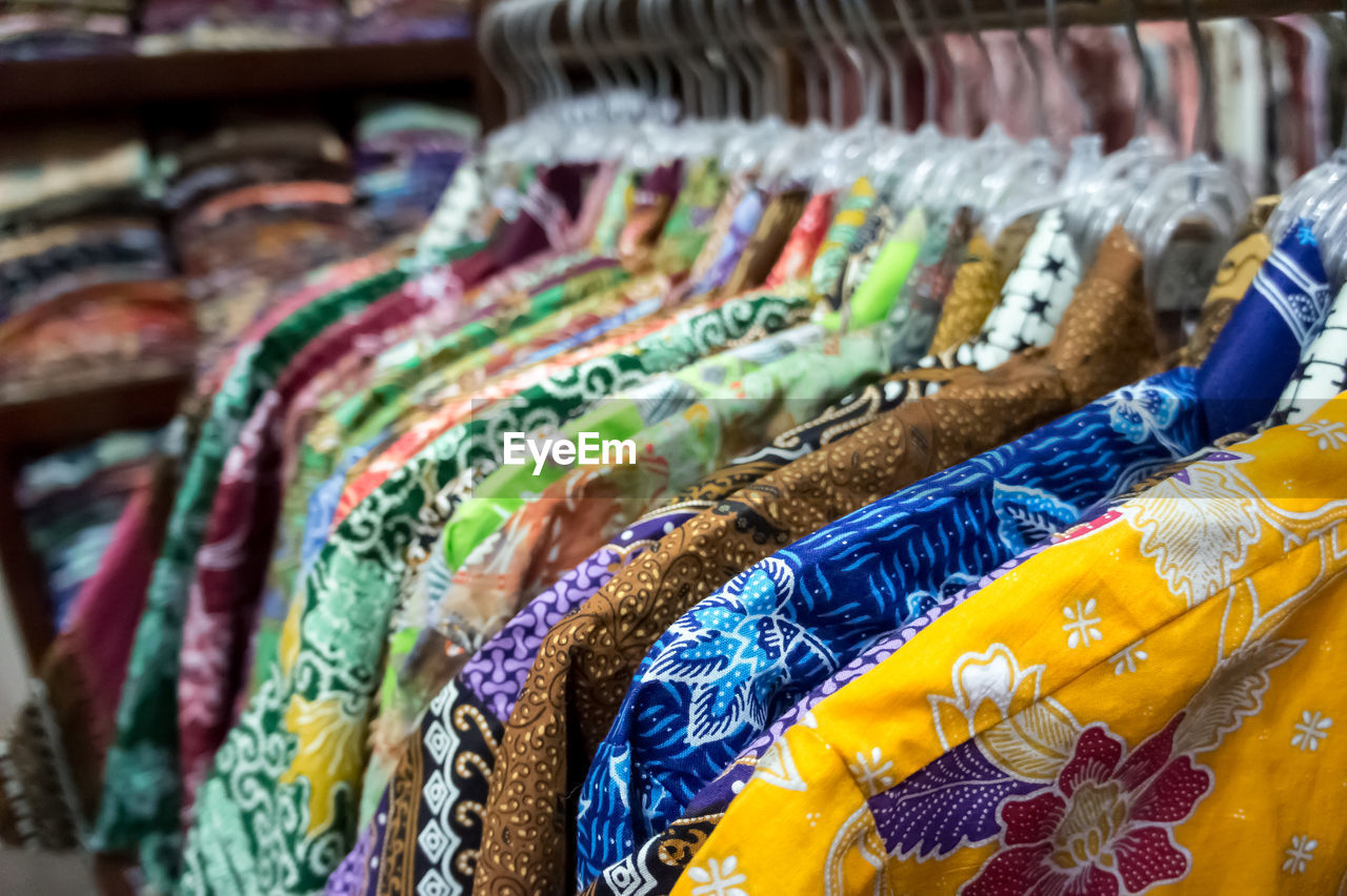 CLOSE-UP OF CLOTHES FOR SALE IN MARKET