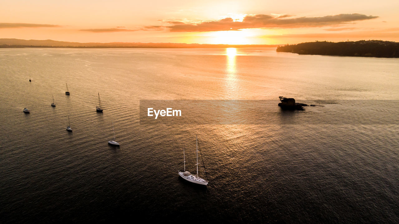 Scenic view of sea against sky during sunset