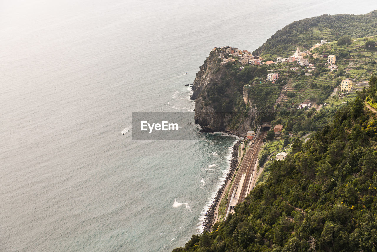 High angle view of sea and rocky mountains