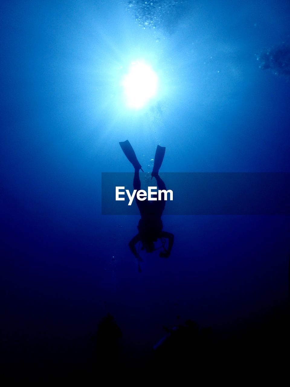 Low angle view of person swimming in sea