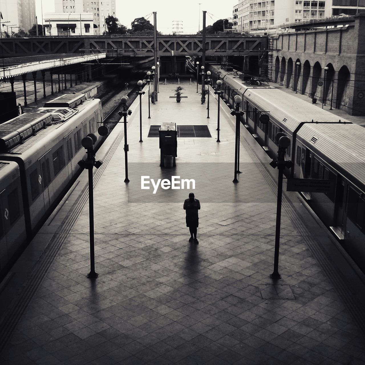 Man on railroad platform