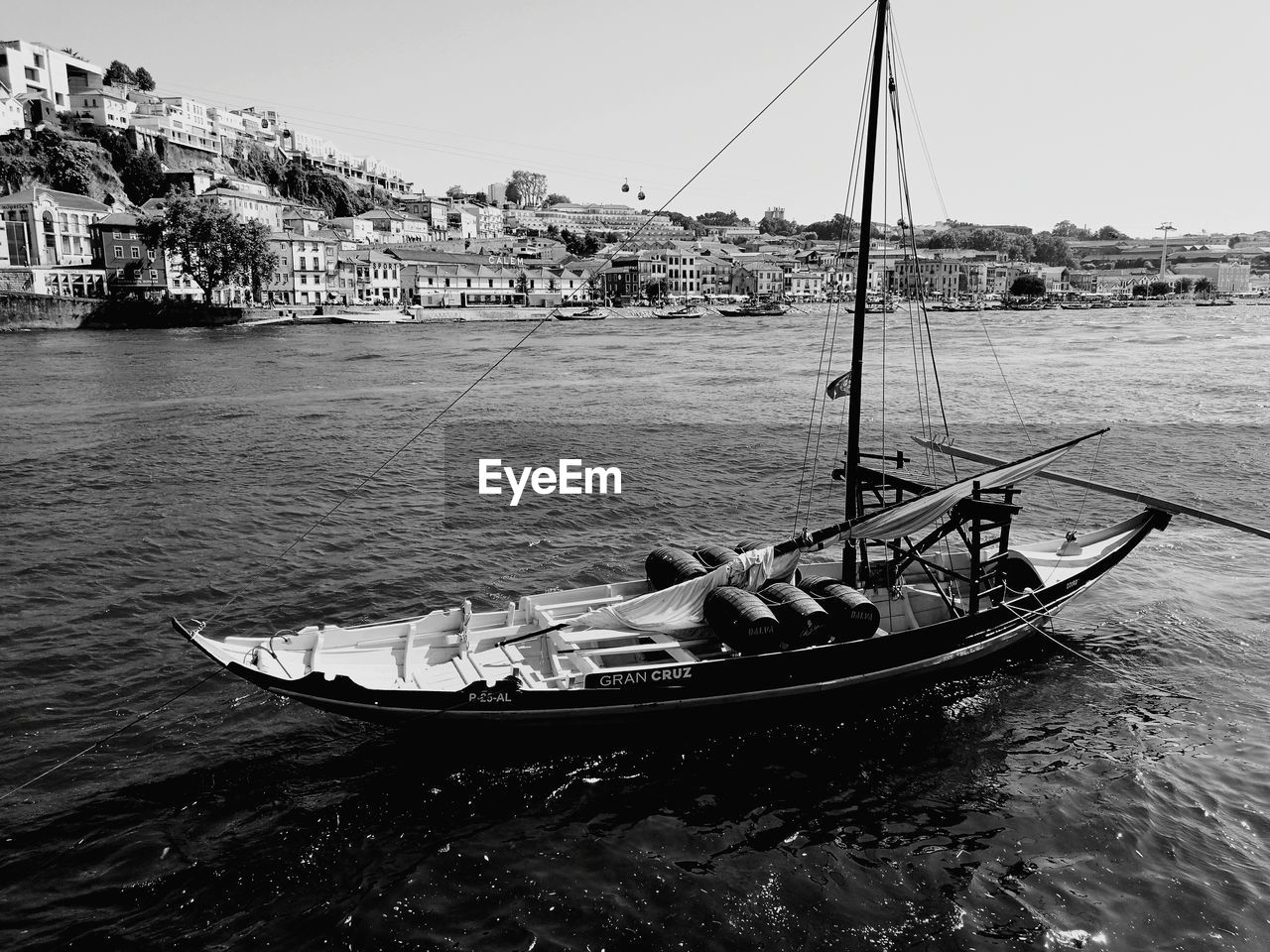 High angle view of boat on river in city