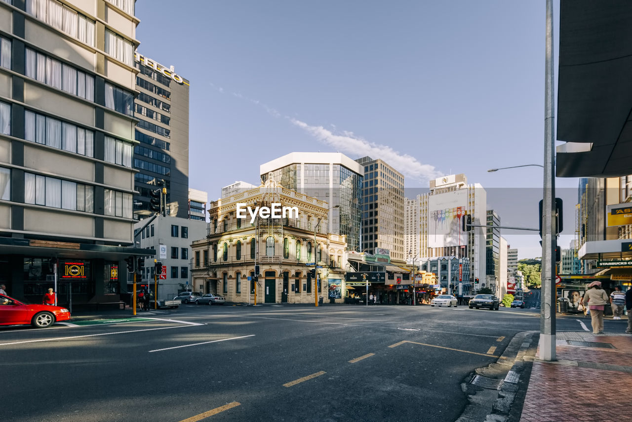 VIEW OF CITY STREET AND BUILDINGS