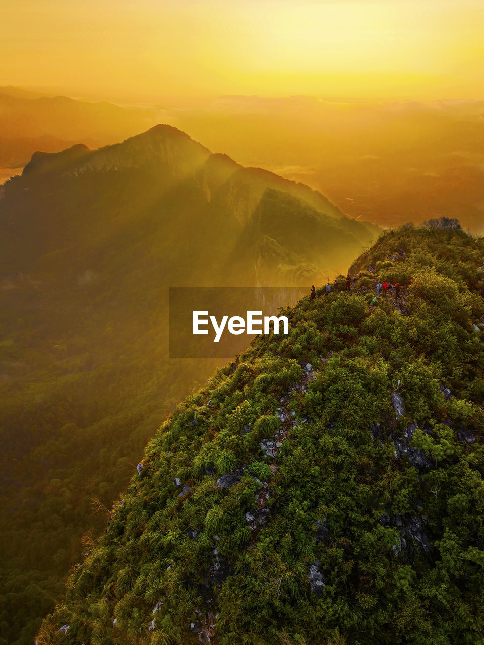 SCENIC VIEW OF MOUNTAINS DURING SUNSET